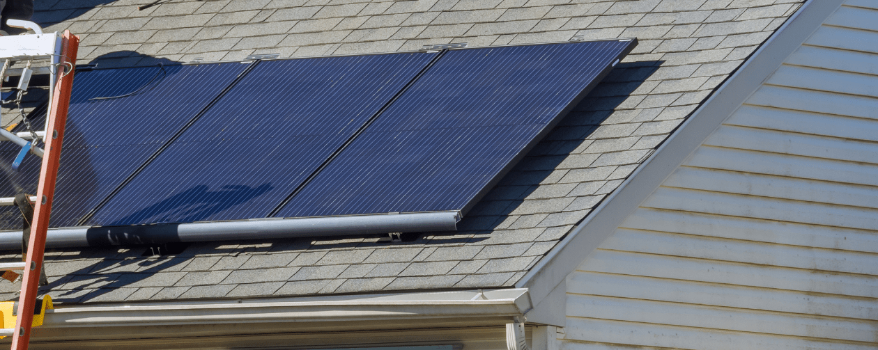 Solar contractors prepairing to remove solar panels from roof